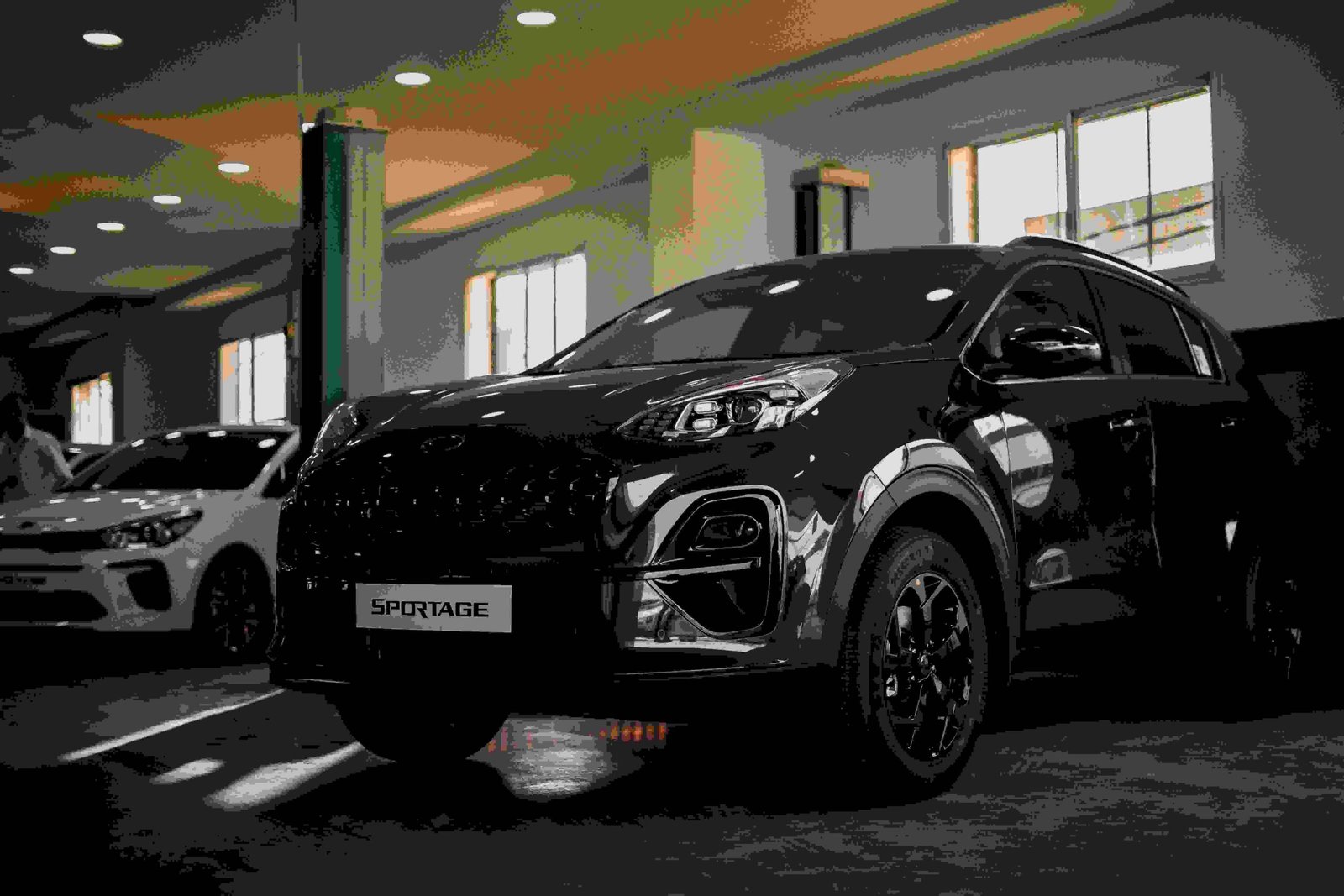 black kia sportage car
